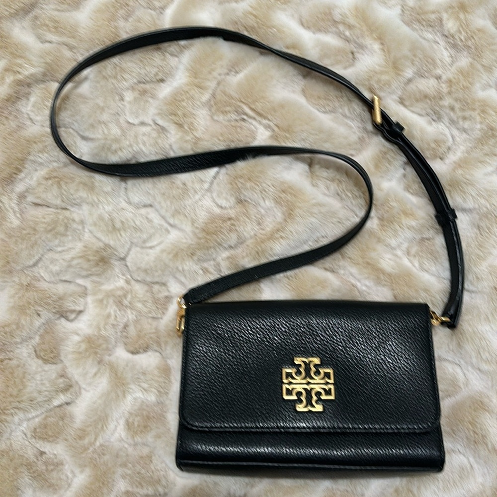 Tory Burch black crossbody with gold detail. Excellent condition